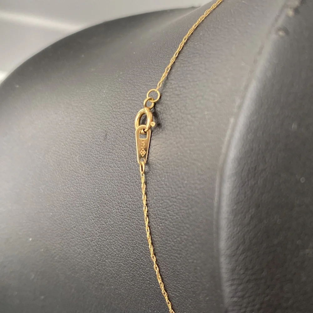 Mignonette NWOT gold, and diamond heart locket necklace
